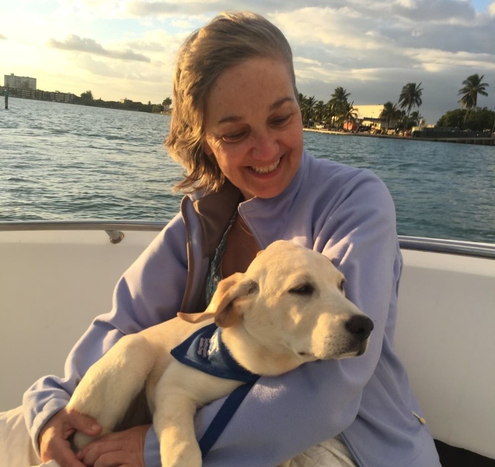 Suzanne and Leland, guide dog in training